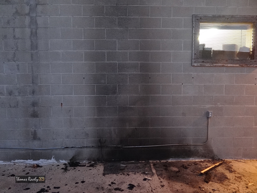Fire behind Gun & Reel    CSi Photo